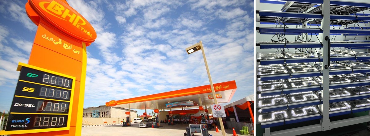 BHP petrol station outdoor LED price totem showing fuel prices in red digits