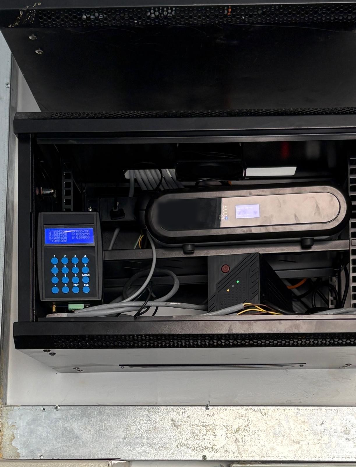 AVS PCU Controller and Price Sign Terminal installed in a station control cabinet
