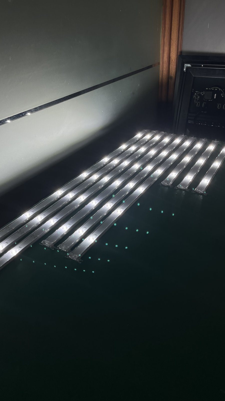 Backlight inside signage — open signage showing the lens strips installed