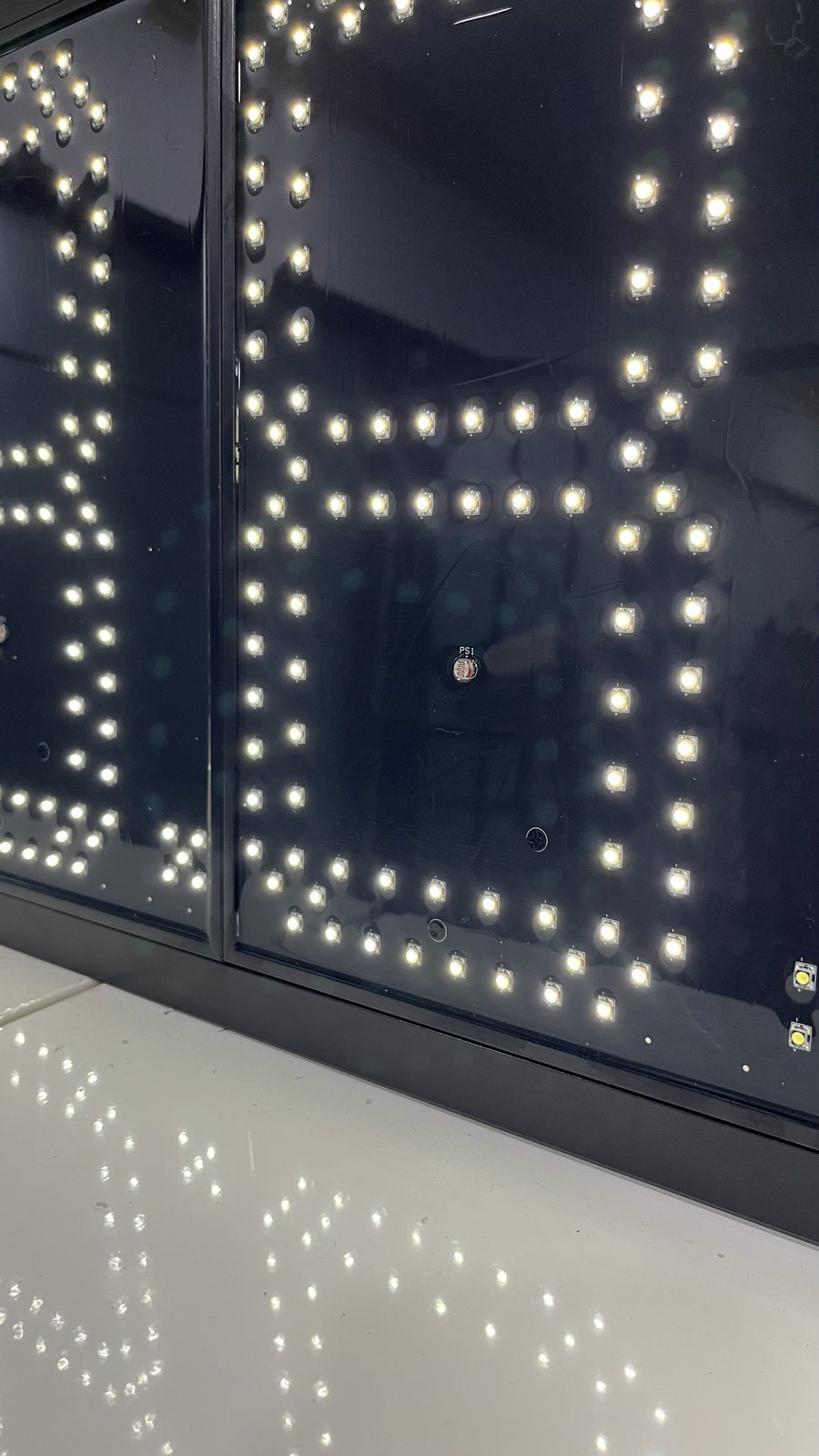 Close-up of the LED + LED brand logo (Osram/Cree)