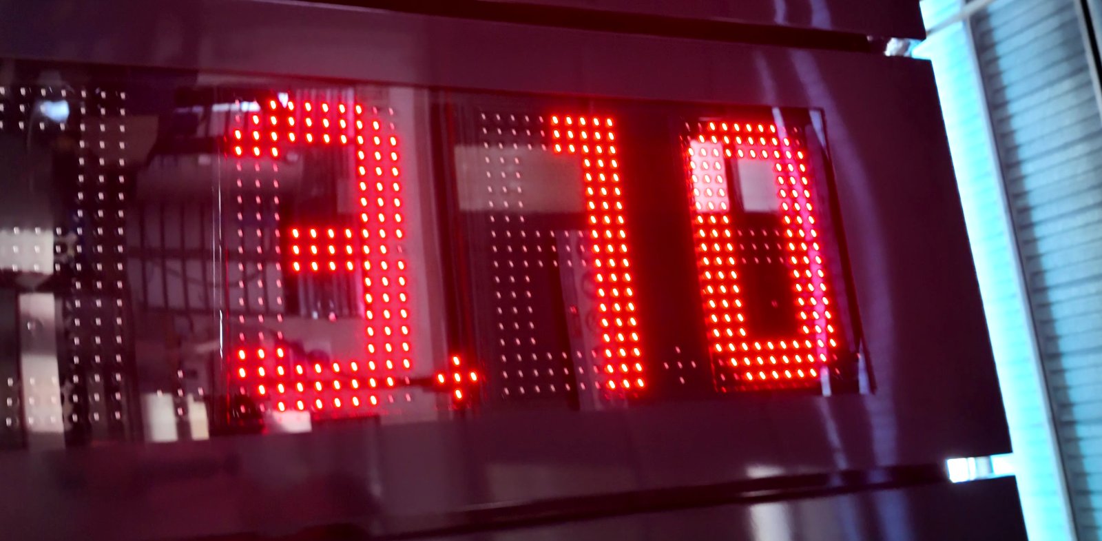 Close-up of a lit LED price digit — the individual LEDs that form each segment of the character
